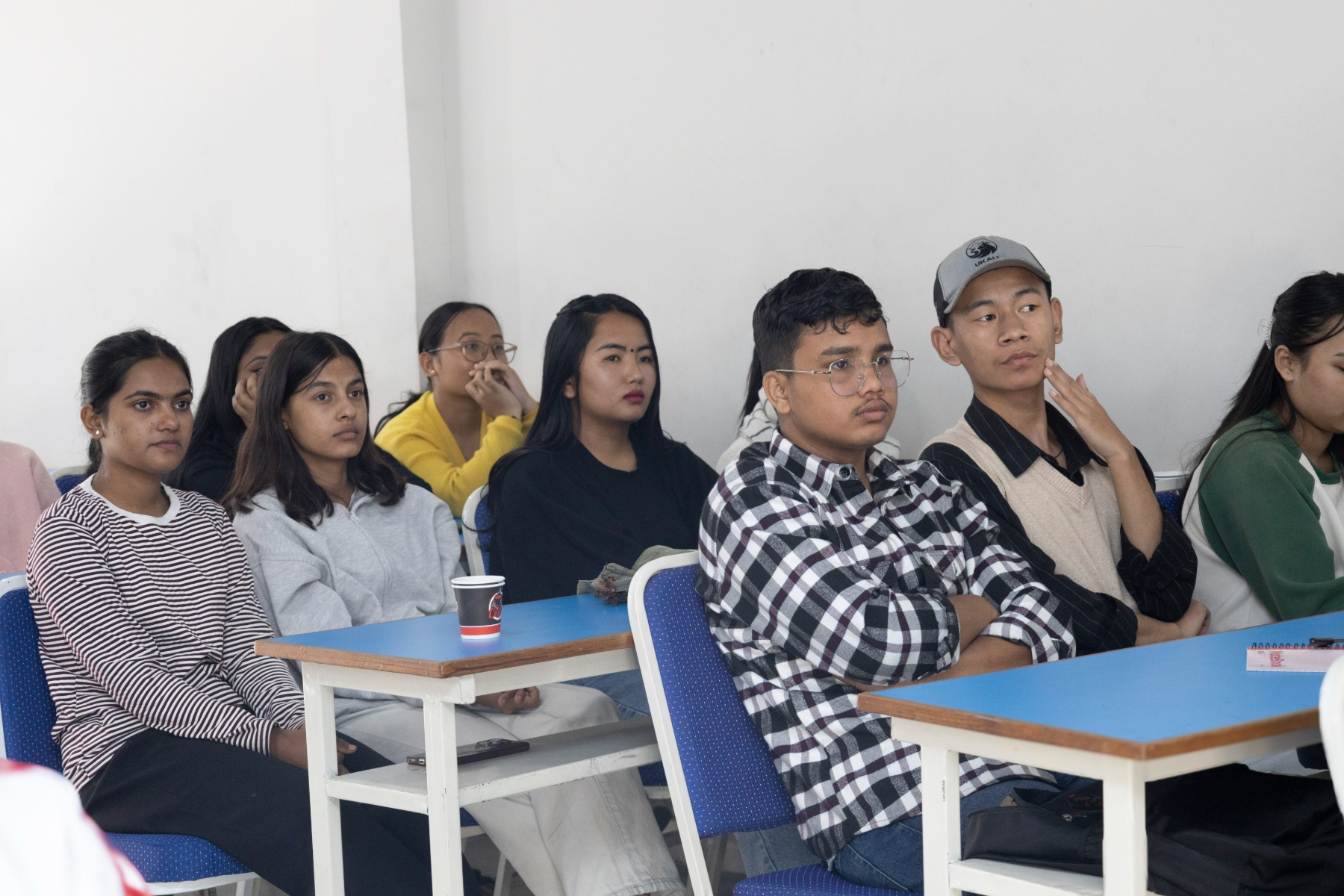 Newly joined students listening to the SCM Tech Club introduction