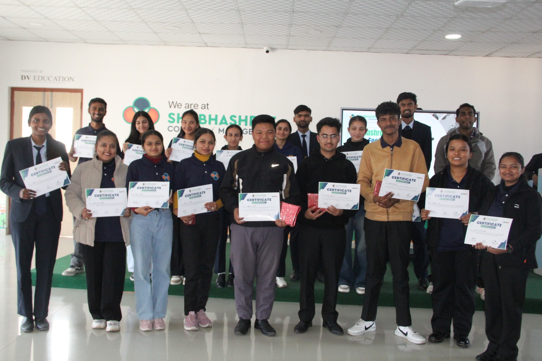 Participants holding their certificates at Shubhashree Speak Fest 2082