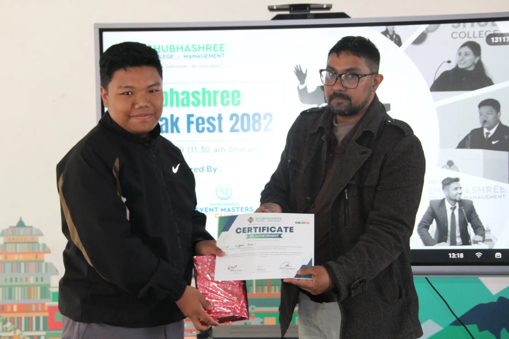 Sugam Ghale receiving a Certificate of Achievement at Shubhashree Speak Fest 2082